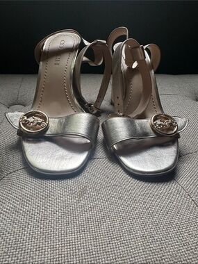 Coach Metallic Gold Open-Toe Ankle Strap Heels with Logo Medallion
